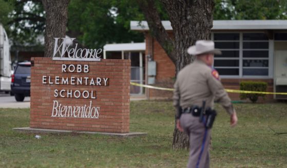An officer walks in front of Robb Elementary School in Uvalde, Texas, on May 24.