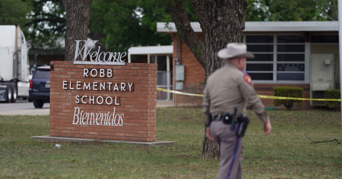 An officer walks in front of Robb Elementary School in Uvalde, Texas, on May 24.