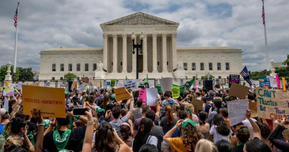 Pro-abortion activists protest in front of the Supreme Court in Washington, D.C., on June 24.