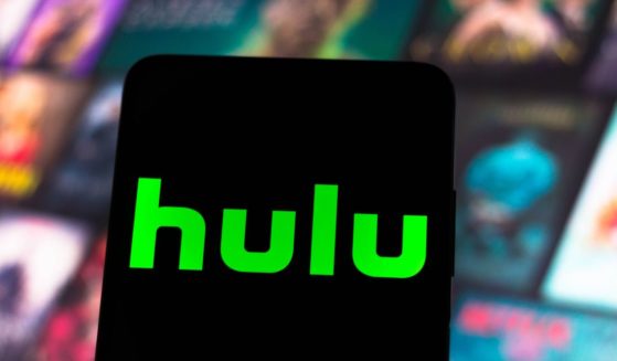 The Hulu logo is displayed on a smartphone screen on June 13.