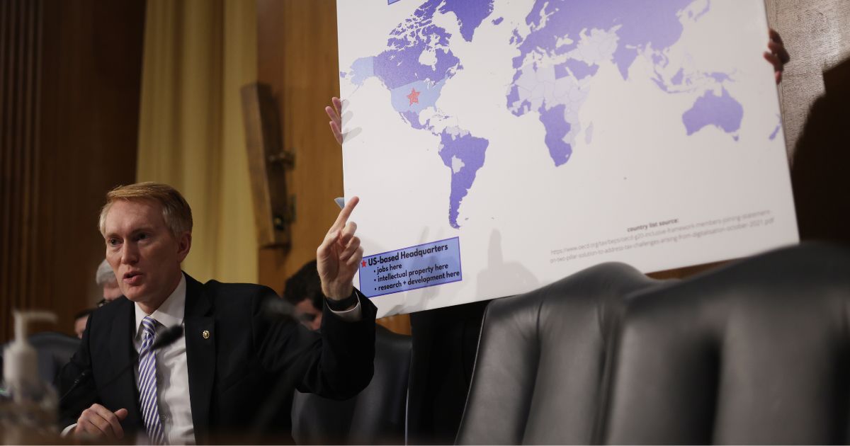 Sen. James Lankford points to a world map during a Senate Finance Committee hearing at the Dirksen Senate Office Building in Washington, D.C., on June 7.
