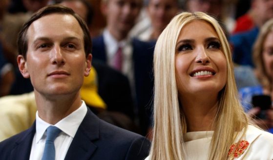 Jared Kushner and his wife, Ivanka Trump, watch as then-President Donald Trump speaks during his re-election kickoff rally at the Amway Center in Orlando, Florida, on June 18, 2019.