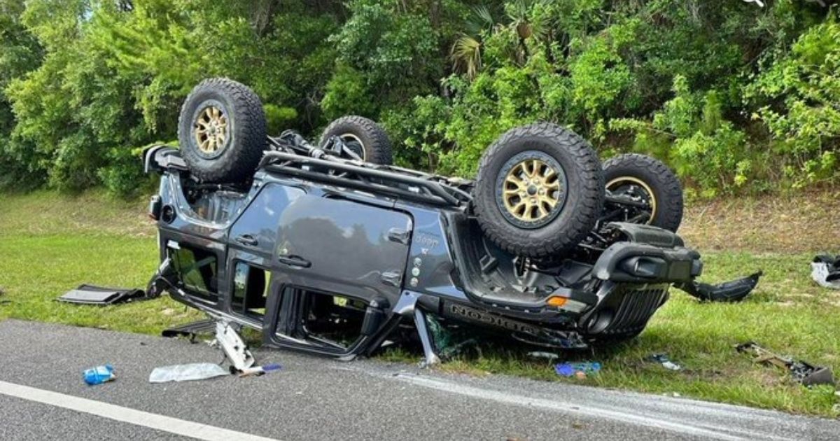 A Jeep is seen flipped at State Road 100 and John Anderson Blvd. in Flagler County, Florida.