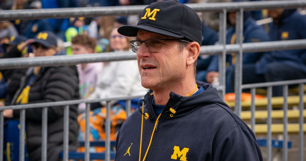 Michigan football coach Jim Harbaugh walks out of the tunnel prior to the Wolverines' spring game at Michigan Stadium in Ann Arbor on April 2.
