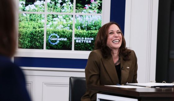 Vice President Kamala Harris laughs during a virtual town hall from the Eisenhower Executive Office Building in Washington on Oct. 14, 2021.