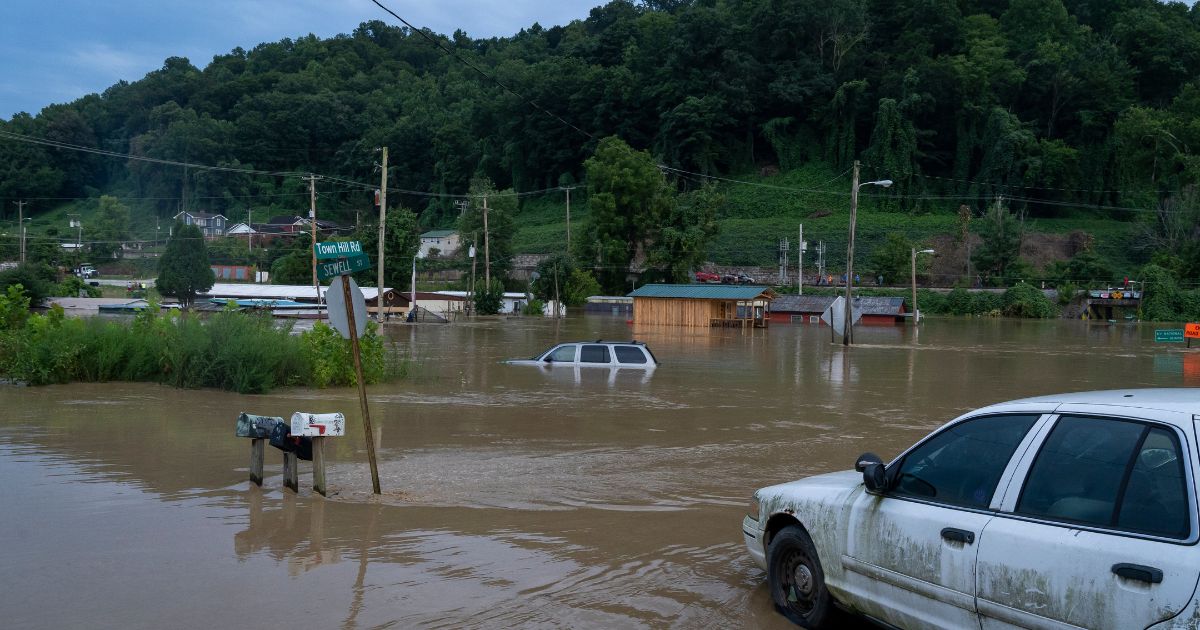 Thursday rains in eastern Kentucky caused severe flooding throughout the area, claiming several lives including those of four children in one family.