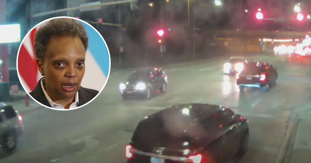 A vehicle in the motorcade of Chicago Mayor Lori Lightfoot, inset, runs a red light.