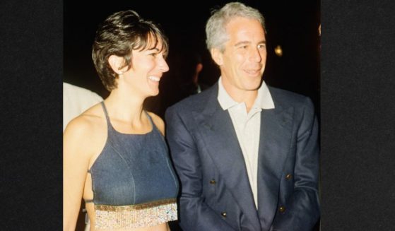 Ghislaine Maxwell and Jeffrey Epstein pose for a portrait during a party at the Mar-a-Lago club, Palm Beach, Florida, Feb. 12, 2000.