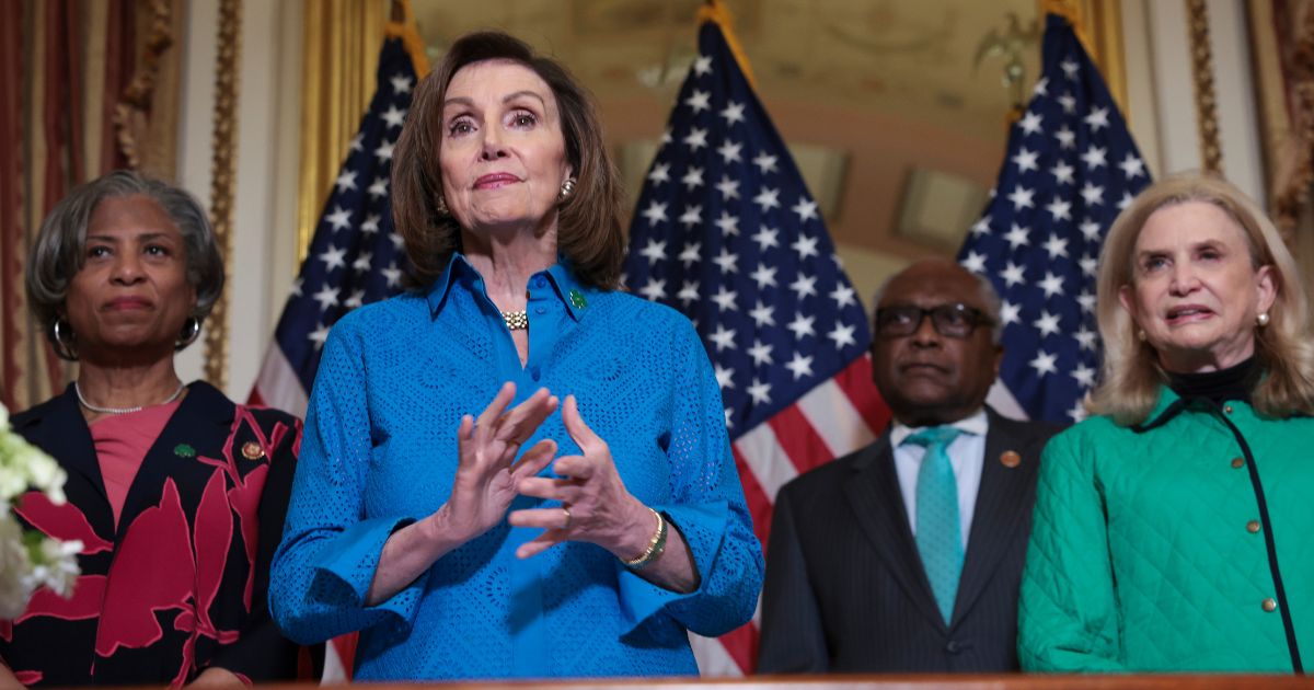 From left, Democratic Reps. Brenda Lawrence of Michigan, Nancy Pelosi of California, James Clyburn of South Carolina and Carolyn Maloney of New York stand together at the U.S. Capitol in Washington on March 17.