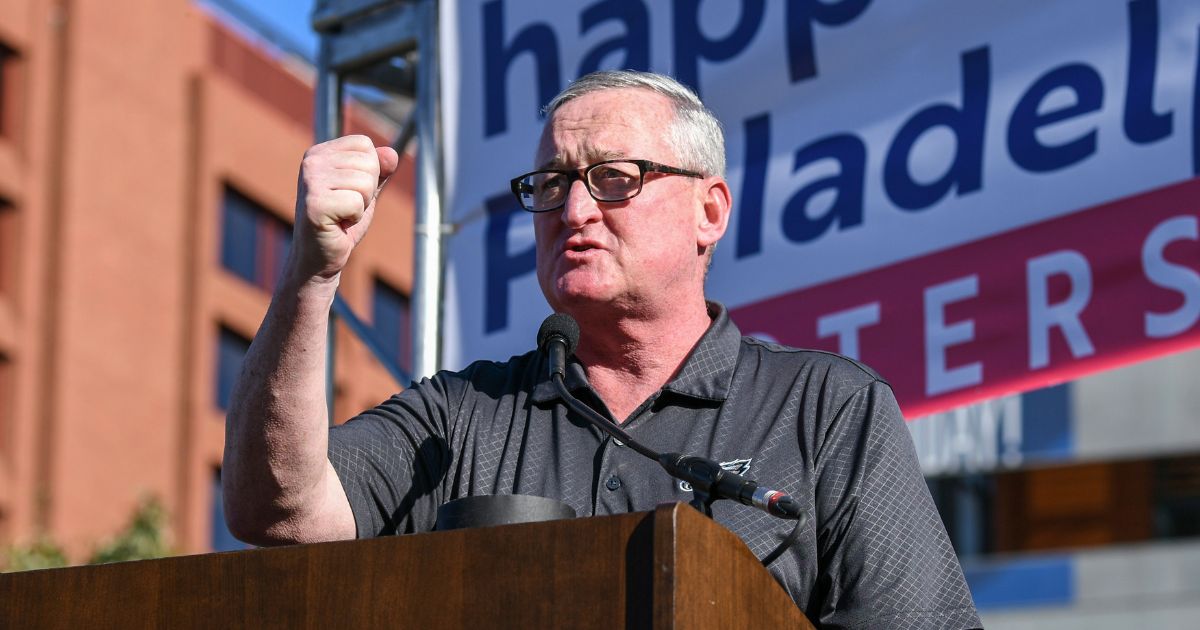 Philadelphia Mayor Jim Kenney speaks during a rally in November 2020. Kenney told reporters he is in constant fear of gun violence and that he'll be glad when he's not mayor anymore.