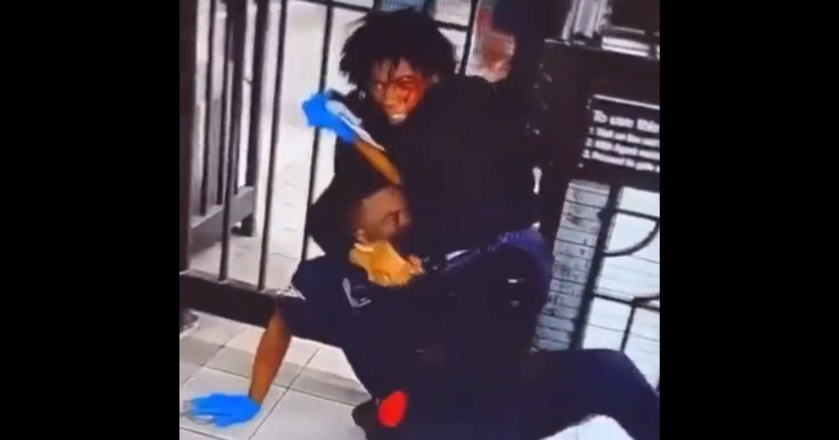 A police officer is put in a chokehold by a teenager in a New York subway brawl.