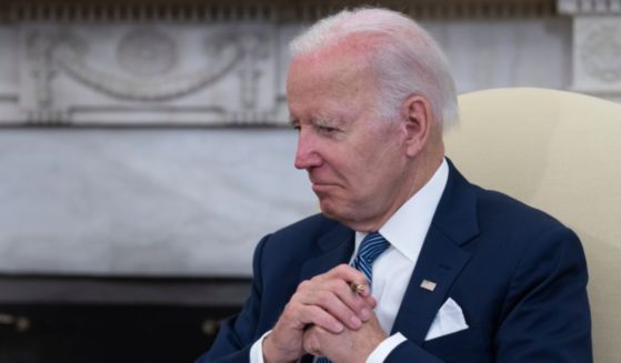 President Joe Biden listens to Mexican President Andrés Manuel López Obrador during their meeting in the Oval Office at the White House on July 12.