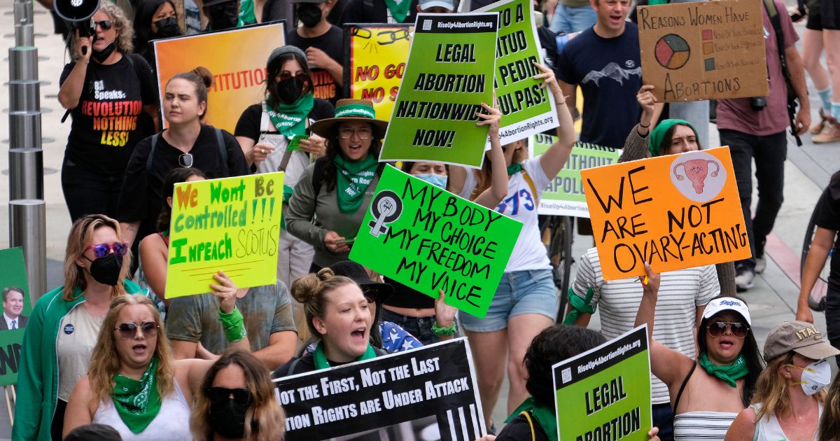 Pro-abortion activists march in Santa Monica, California, on Saturday.