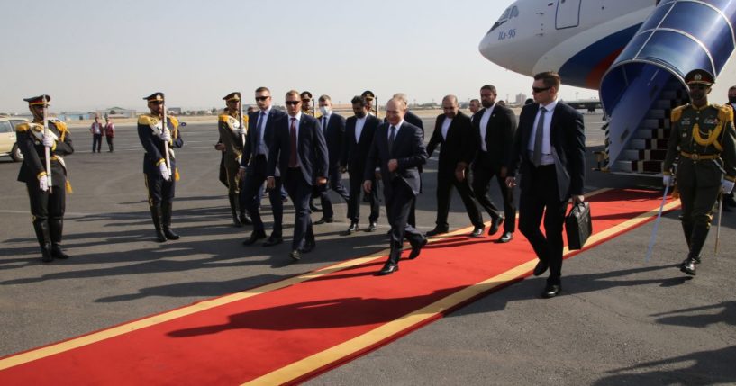 Russian President Vladimir Putin walks on the red carpet after leaving his presidential plane during the welcoming ceremony at the airport in Tehran on Tuesday.