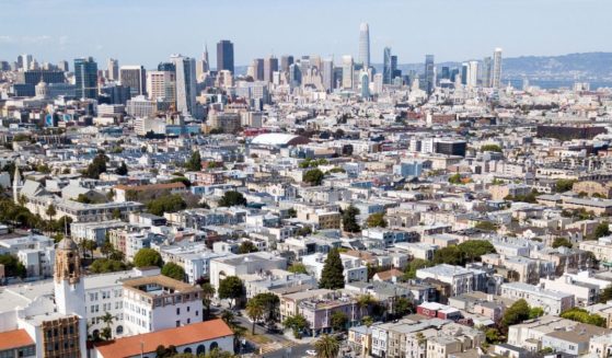 An aerial panoramic view shows the San Francisco skyline as seen from Dolores Park on May 22, 2020.