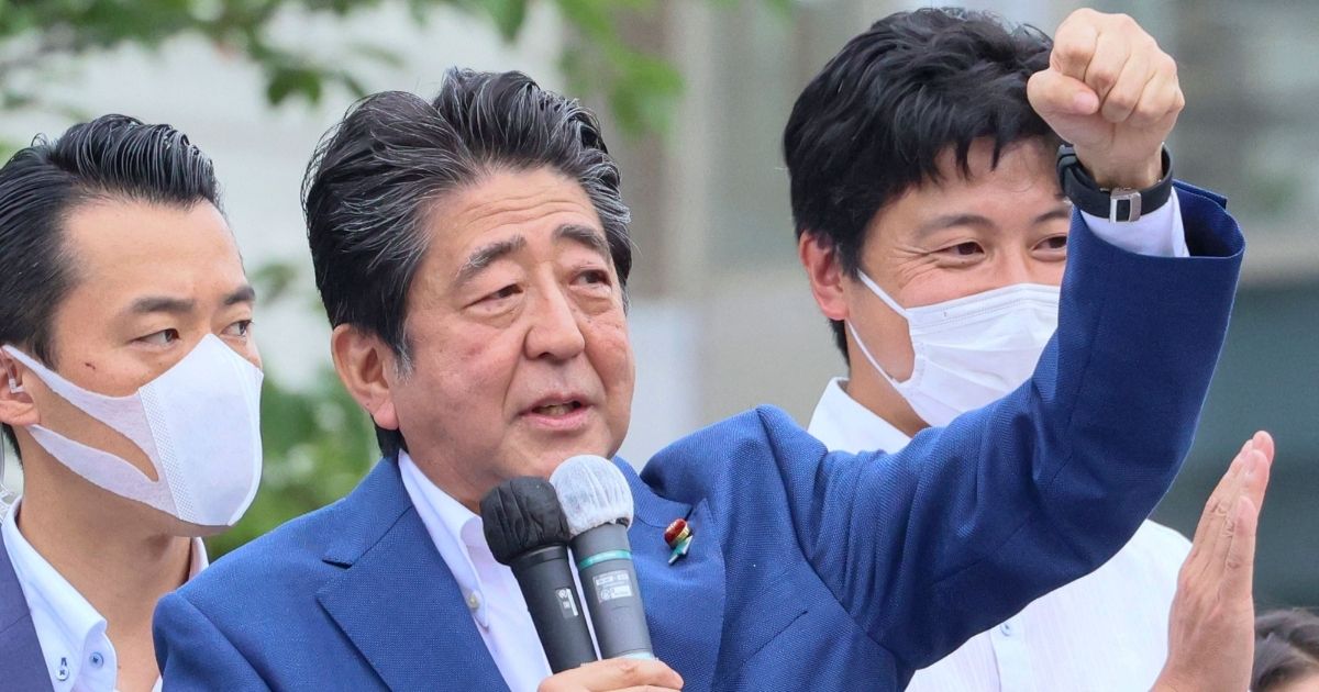 Former Japanese Prime Minister Shinzo Abe delivers a campaign speech for Liberal Democratic Party candidate Keiichiro Asao in Yokohama on Wednesday.