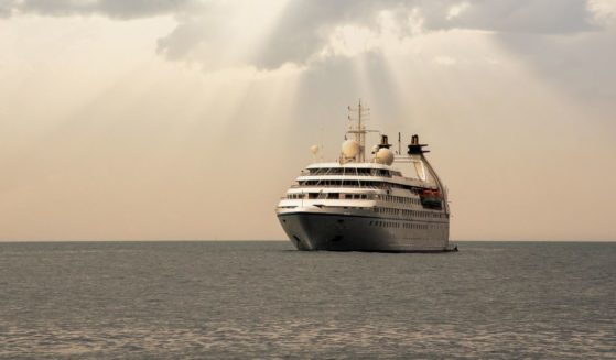 A cruise ship is anchored off the coast of Italy.