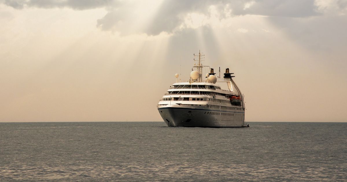 A cruise ship is anchored off the coast of Italy.