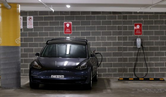 A Tesla Model Y charges at a EV charge station in Sydney's Lane Cove on Jan. 19, 2021.