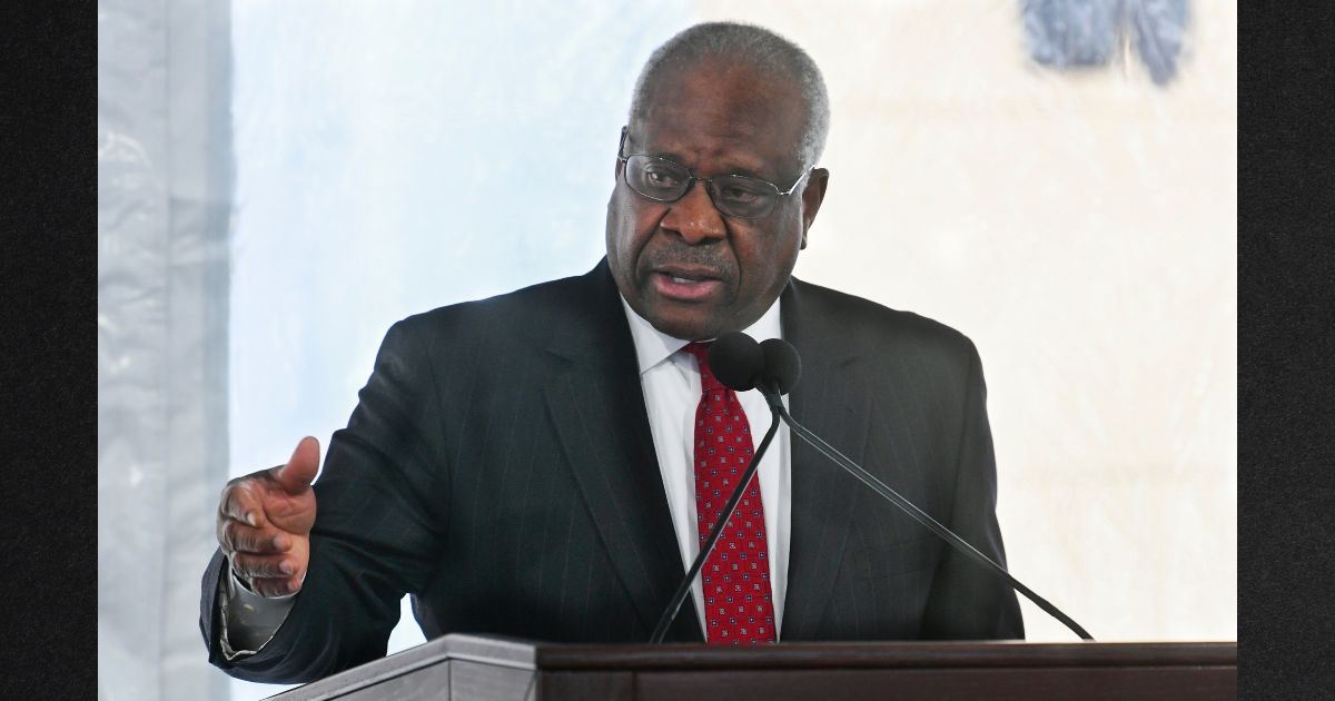 Supreme Court Justice Clarence Thomas, seen in a 2020 photo, informed George Washington University that he will not be available to teach there this year.