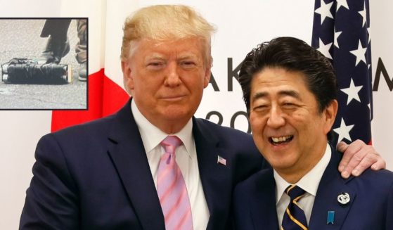 Then-President Donald Trump stands with then-Japanese Prime Minister Shinzo Abe at the start of the G20 Summit in Osaka, Japan, on June 28, 2019. Abe was assassinated on Friday by a man with a homemade firearm, inset.