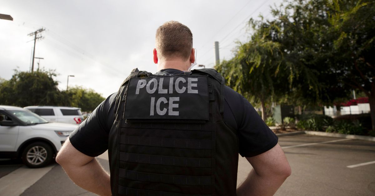 An Immigration and Customs Enforcement officer looks on during an operation in Escondido, California, on July 8, 2019.
