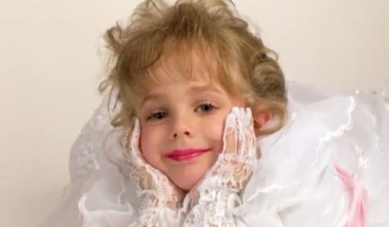 Jonbenet Ramsey was found murdered in 1996, and now her father is asking the governor of Colorado to release the DNA evidence collected at the scene of the crime to a third party for testing and threatening legal action if not.