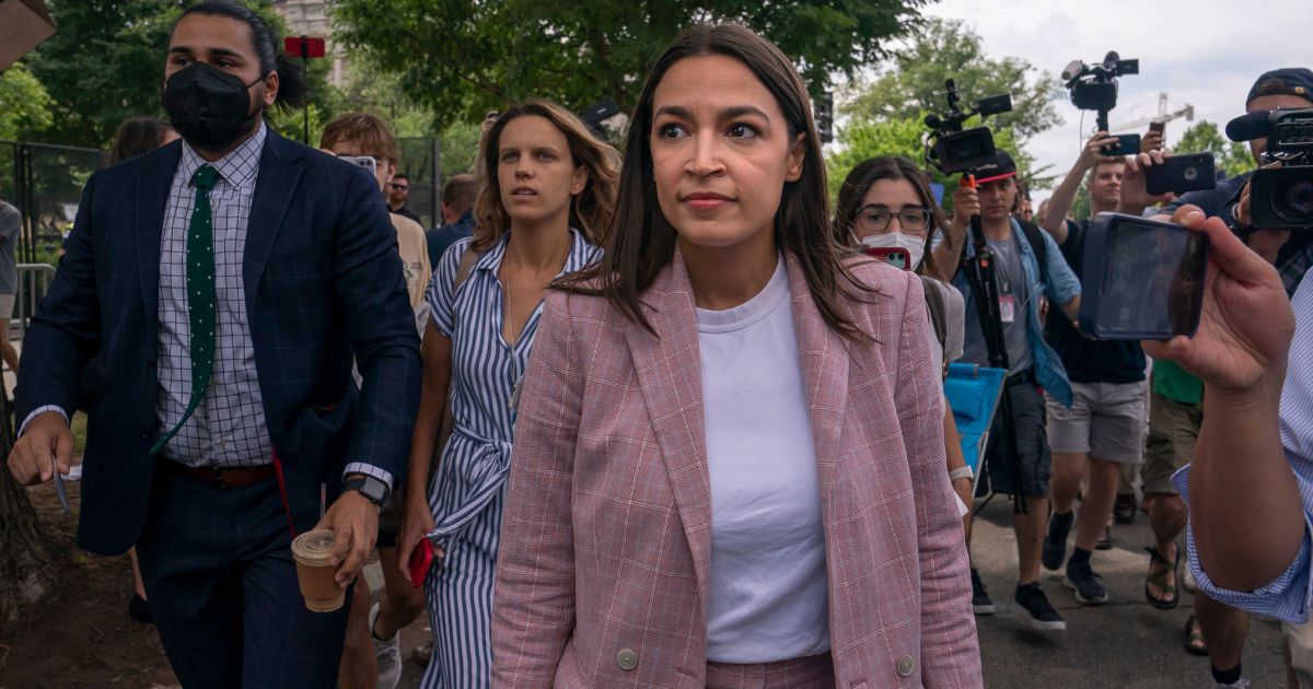 Rep. Alexandria Ocasio-Cortez, a Democrat from New York, leaves after speaking to abortion-rights activists in front of the U.S. Supreme Court after the court announced a ruling in the Dobbs v Jackson Women's Health Organization case on June 24.