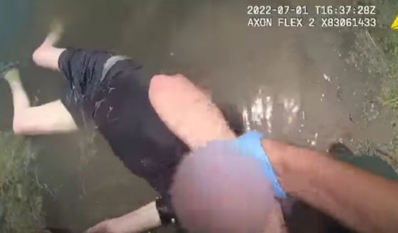 Steven Jones, a deputy with the Orange County Sheriff's Office in Florida, rescues 81-year-old Daniel Waterhouse of Orlando from a retention pond in West Orange County last week.