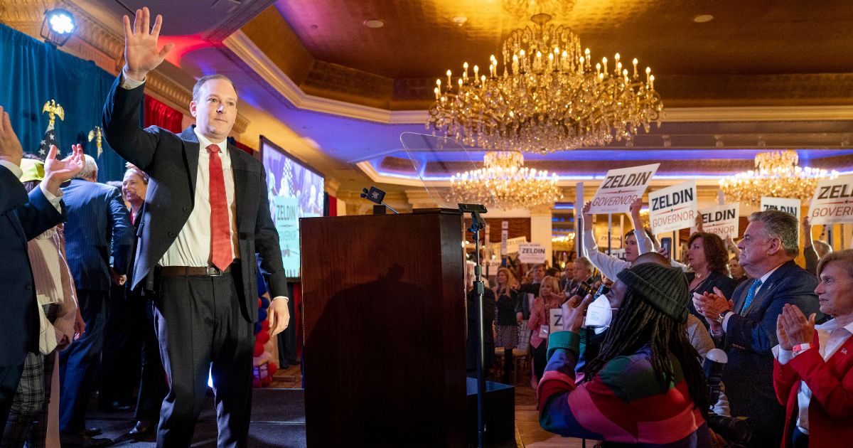 U.S. Rep. Lee Zeldin waves to supporters before speaking to delegates and assembled party officials at the 2022 NYGOP Convention in Garden City, New York, on March 1. Zeldin, the Republican candidate for governor in New York, was attacked on Thursday evening at an upstate event but was not injured.