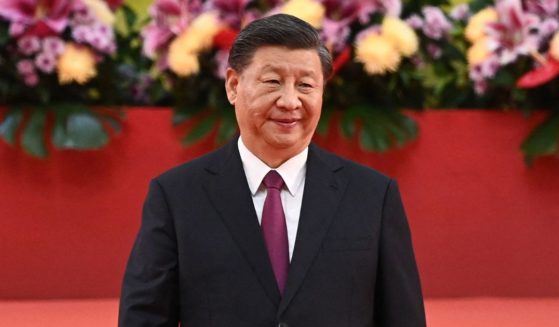 Chinese President Xi Jinping walks away from the podium following a speech in Hong Kong on July 1, the 25th anniversary of the city's handover from Britain to China.