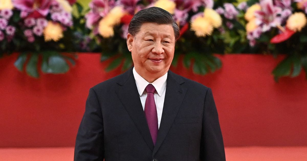 Chinese President Xi Jinping walks away from the podium following a speech in Hong Kong on July 1, the 25th anniversary of the city's handover from Britain to China.