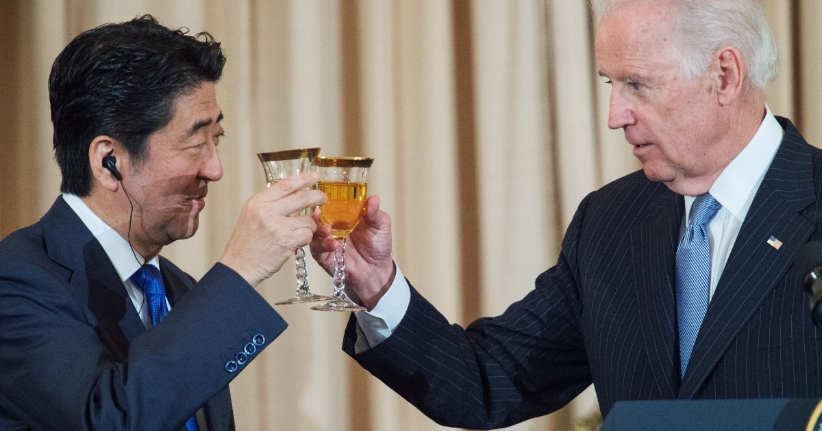 Then-Vice President Joe Biden toasts then-Prime Minister of Japan Shinzo Abe on April 28, 2015, at the Department of State in Washington, D.C.