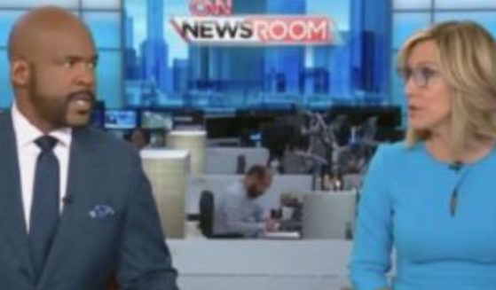 CNN's Victor Blackwell and Alyson Camerota are pictured on the set of "CNN Newsroom" on Monday.