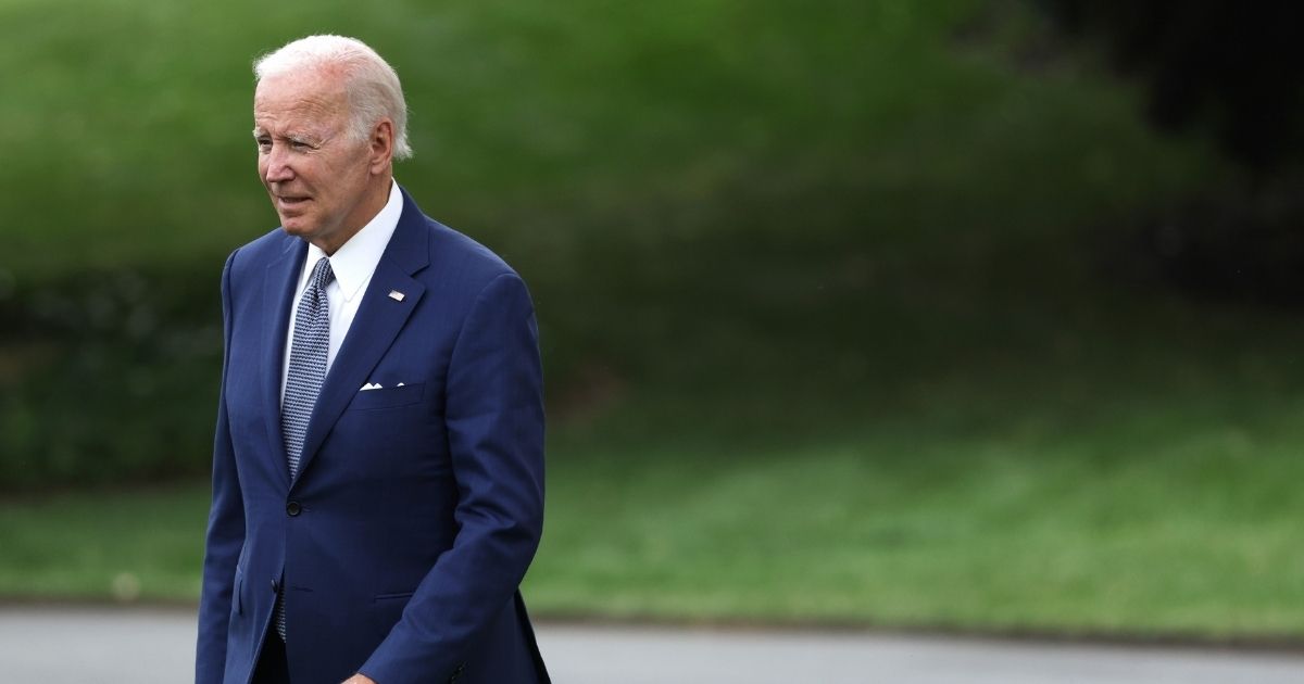 President Joe Biden walks on the South Lawn prior to his departure from the White House on Friday in Washington, D.C.
