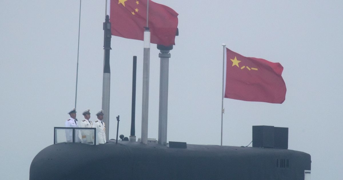 A Chinese People's Liberation Army submarine participates in a naval parade in eastern China's Shandong province in a file photo from 2019. China is reportedly planning to join Russia, Iran and several other countries in conducting war games in Venezuela in August, bringing hordes of enemies to the United States' backyard.