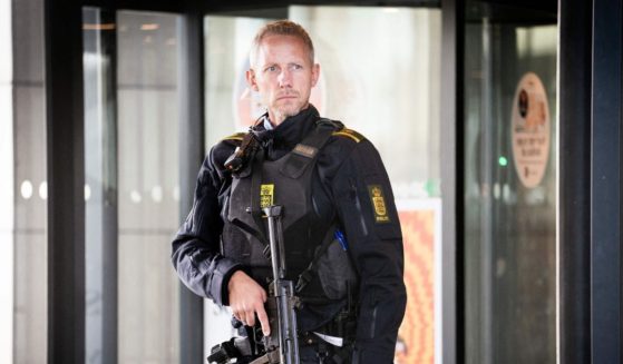 A Danish police officer on Tuesday secures the area where a mass shooting occurred in Copenhagen two days earlier.