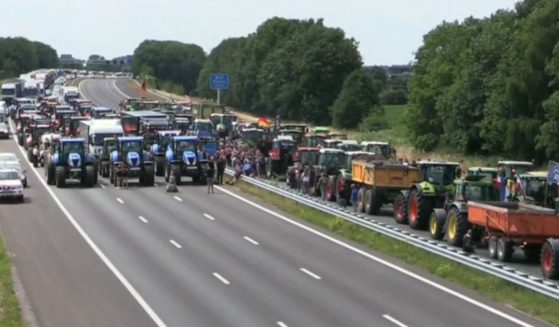 Dutch farmers block the border between the Netherlands and Germany with their tractors to protest a new climate policy.