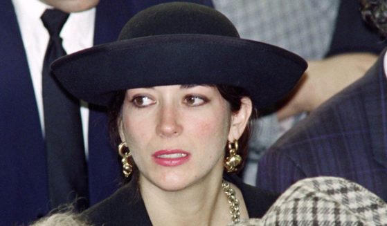 Ghislaine Maxwell attends her father's funeral on the Mount of Olives in Israel on November 10, 1991.