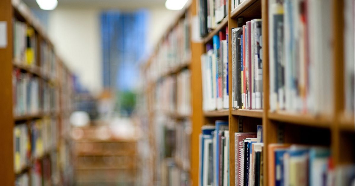 Books on shelves in a library.