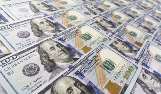 $100 bills are seen in this stock image.
