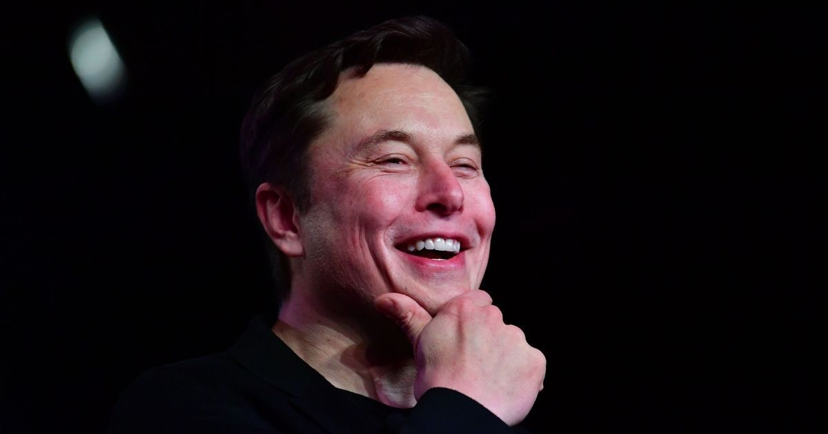 Tesla CEO Elon Musk smiles during the unveiling of the Tesla Model Y in Hawthorne, California, on March 14, 2019.