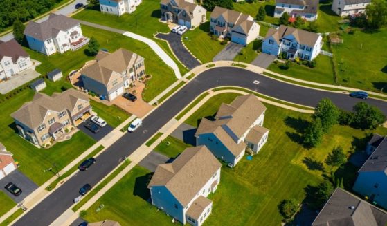 A suburban neighborhood is seen in this stock image.