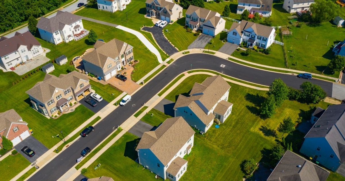 A suburban neighborhood is seen in this stock image.