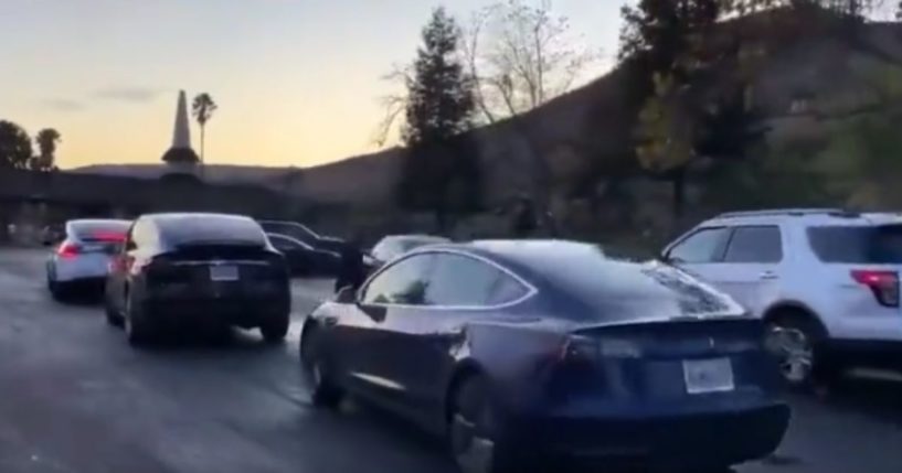 A Tesla charging line can be seen in California.