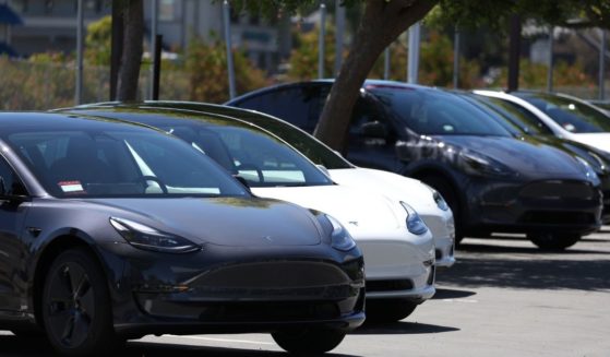 Tesla cars sit in a parking lot at a Tesla showroom on June 27, in Corte Madera, California.