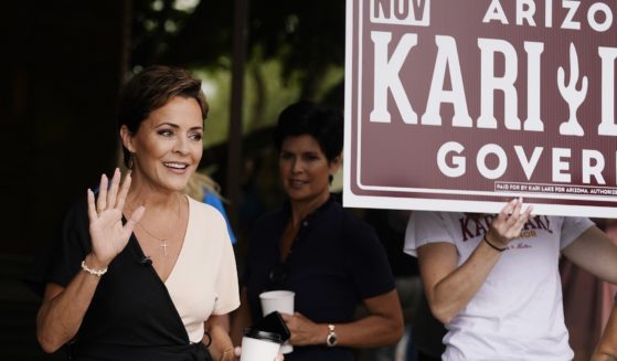 Kari Lake, Republican candidate for Arizona governor, waves to supporters before speaking at a news conference this week in Phoenix.
