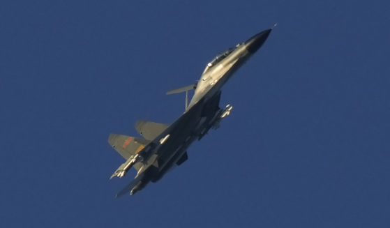 A Chinese J-11 military fighter jet flies on Friday above the Taiwan Strait near Pingtan, the closest land of mainland China to the island of Taiwan.