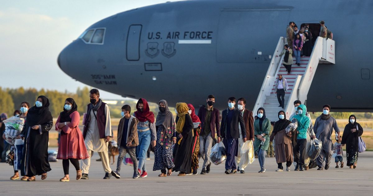 Refugees disembark from a U.S. Air Force aircraft after an evacuation flight from Kabul in Rota, southern Spain, on Aug. 31, 2021.