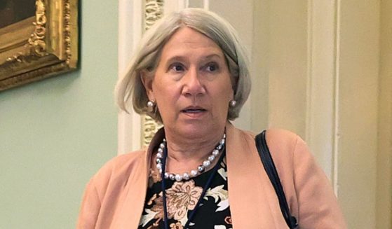 Anita Dunn, senior adviser to President Joe Biden, arrives for a lunch meeting with Senate Democrats at the Capitol in Washington on July 22, 2021.